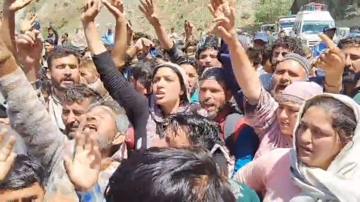 People blocking Jammu-Srinagar national highway in protest against cow vigilantes who assaulted a local youth carrying a bovine animal home in a vehicle. (Express Photo) man missing