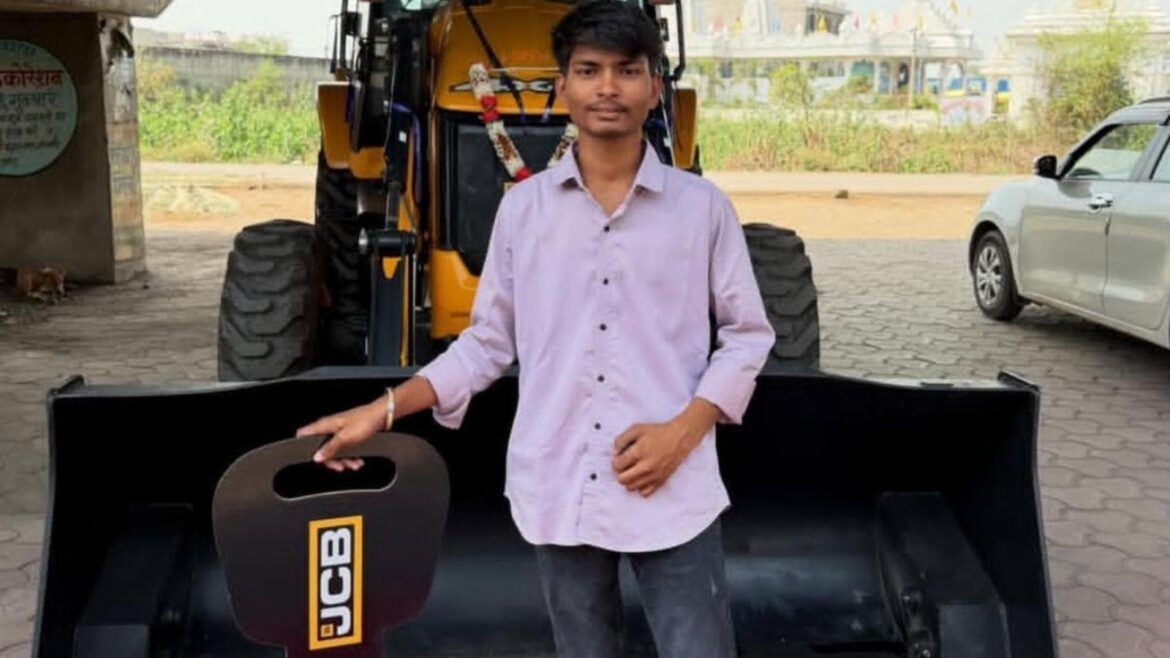 Ayush Kashyap, the deceased, standing in front of his new JCB. Express photo